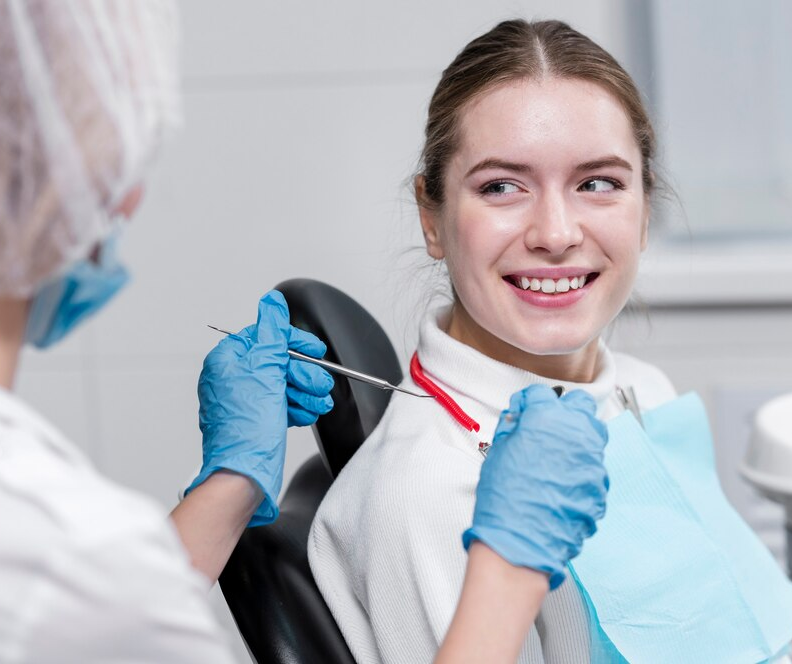 Front view adult female at the dentist